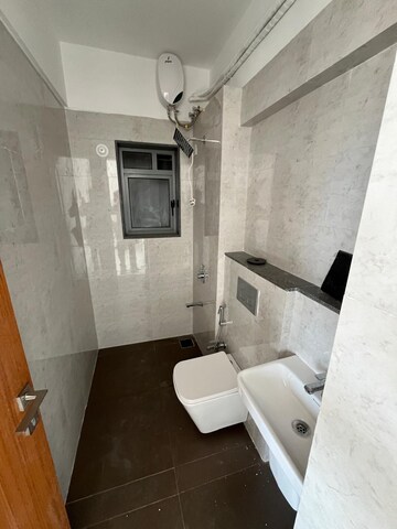 Bathroom in 1 BHK Apartment at Omkar Signet, Malad East – for Rent