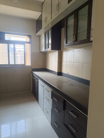 Kitchen in 2.5 BHK Apartment at Lodha Splendora, Ghodbunder Road – for Sale