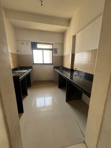 Kitchen in 2 BHK Apartment at Lodha Splendora, Ghodbunder Road – for Sale