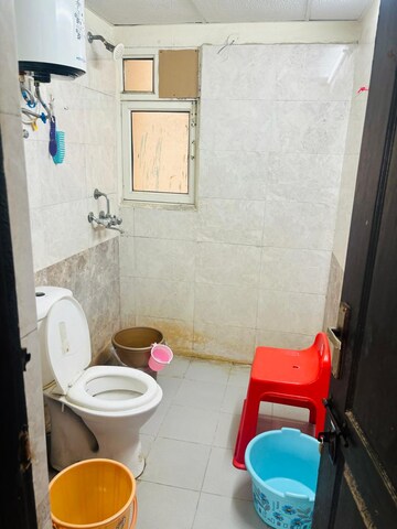 Bathroom in 3 BHK Apartment at Aims Golf City, Sector 75 – for Sale