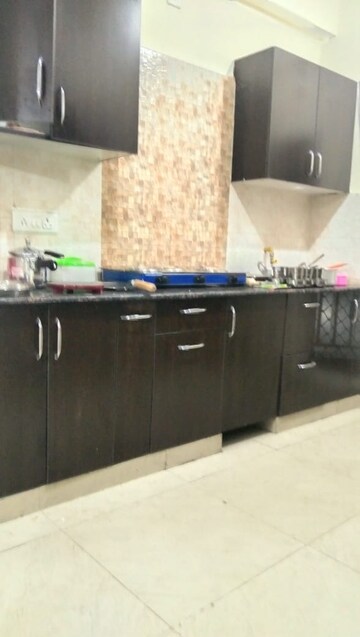 Kitchen in 2 BHK Apartment at Aims Golf City, Sector 75 – for Rent