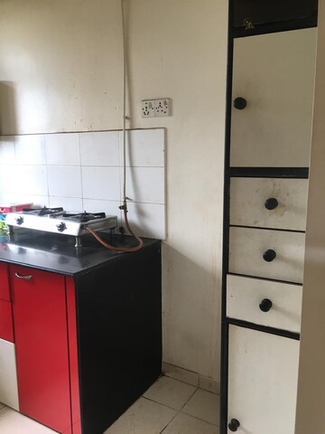 Kitchen in 2 BHK Apartment at Harmony Residency Owale, Owale – for Rent