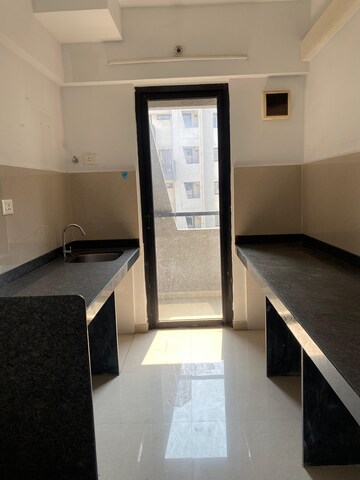 Kitchen in 1 BHK Apartment at Lodha Lakeshore Greens, Dombivli East – for Rent