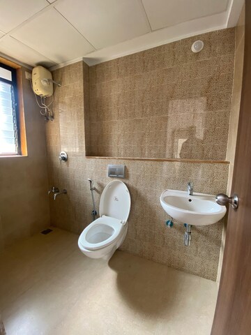 Bathroom in 1 BHK Apartment at Lodha Lakeshore Greens, Dombivli East – for Rent