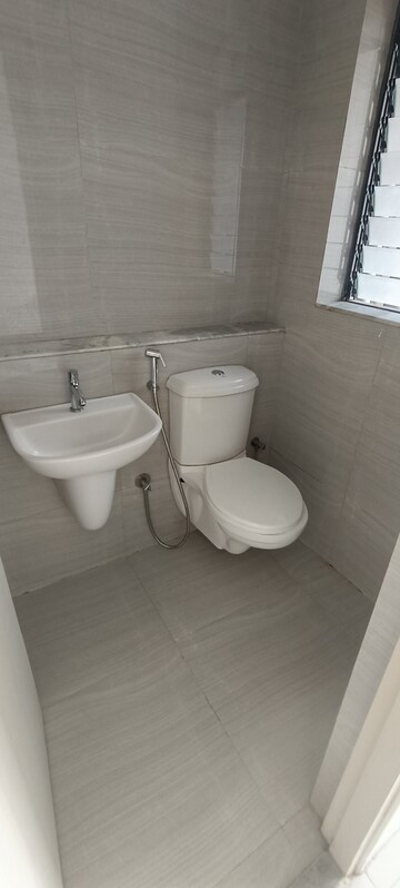 Bathroom in 1 BHK Apartment at Runwal Gardens, Dombivli East – for Rent