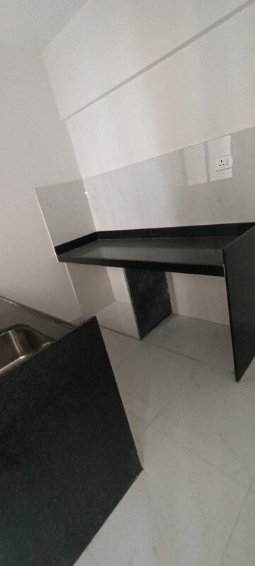 Kitchen in 1 BHK Apartment at Runwal Gardens, Dombivli East – for Rent
