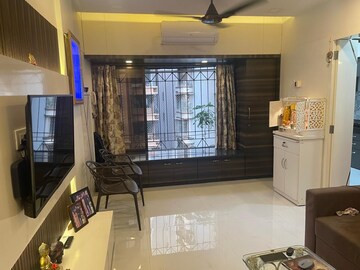 Living Room in 2 BHK Apartment at Kamala Vihar CHS, Kandivali West – for Rent