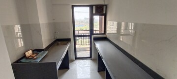 Kitchen in 2 BHK Apartment at Runwal Gardens, Dombivli East – for Rent