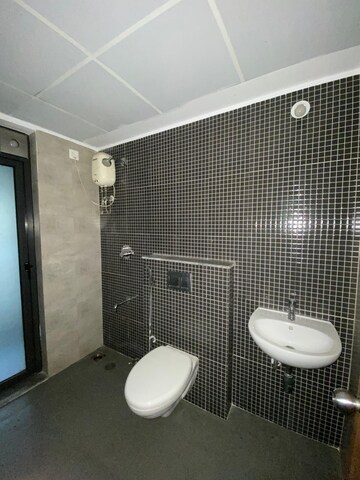 Bathroom in 2 BHK Apartment at Lodha Lakeshore Greens, Dombivli East – for Rent