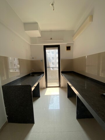 Kitchen in 1.5 BHK Apartment at Lodha Lakeshore Greens, Dombivli East – for Rent