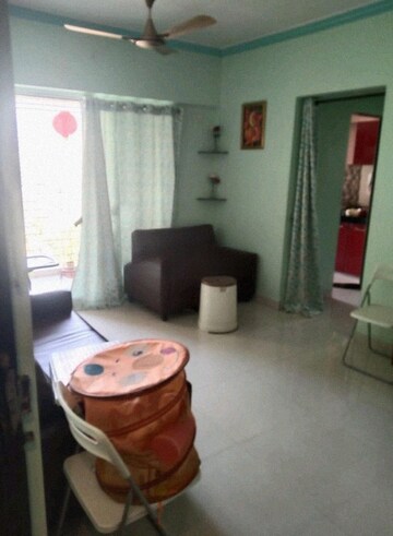 Living Room in 1 BHK Apartment at Cosmos Orchid, Ghodbunder Road – for Rent