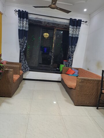 Living Room in 2 BHK Apartment at Swastik Park CHS, Ghodbunder Road – for Sale