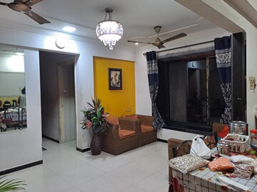 Living Room in 2 BHK Apartment at Swastik Park CHS, Ghodbunder Road – for Sale