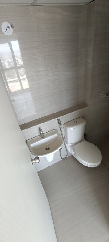 Bathroom in 2 BHK Apartment at Runwal Gardens, Dombivli East – for Rent