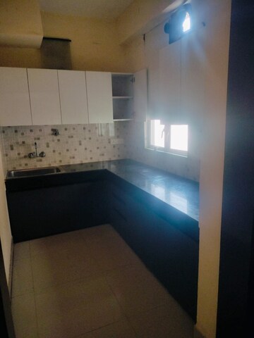 Kitchen in 2 BHK Apartment at Proview Officer City 2, Raj Nagar Extension – for Rent