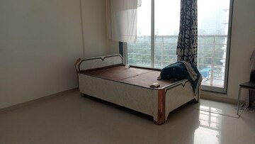 Bedroom in 2 BHK Apartment at Lokhandwala Infrastructure Octacrest, Kandivali East – for Sale