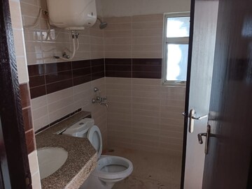 Bathroom in 3 BHK Apartment at AWHO Shanti Vihar, Sector 95 – for Sale
