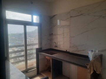 Kitchen in 2 BHK Apartment at Ridhi Sidhi CHS, Kalyan East – for Rent