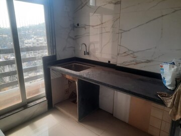 Kitchen in 2 BHK Apartment at Ridhi Sidhi CHS, Kalyan East – for Rent