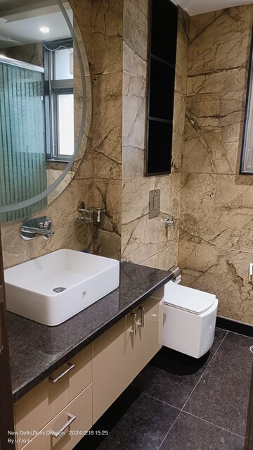 Bathroom in 3 BHK Builder Floor at Freedom Fighters Enclave – for Rent