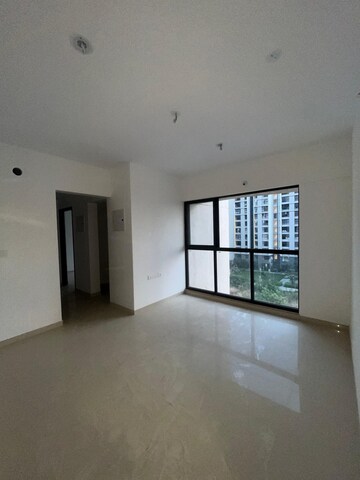 Living Room in 2 BHK Apartment at Lodha Palava Downtown Dombivli East, Dombivli East – for Rent