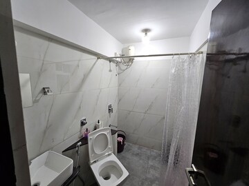 Bathroom in 2 BHK Apartment at Millionaire Heritage, Andheri West – for Rent
