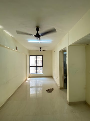 Living Room in 1 BHK Apartment at Lodha Crown Quality Homes Dombivli, Dombivli East – for Rent