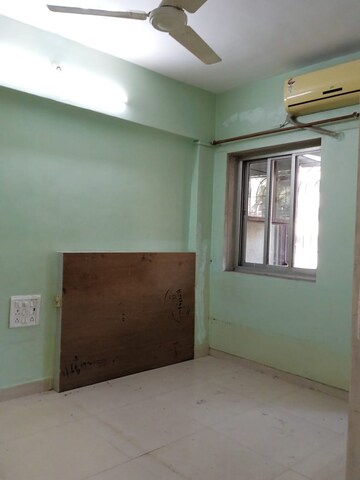 Room in 2 BHK Apartment at Rajkumar Corner CHS, Andheri West – for Rent
