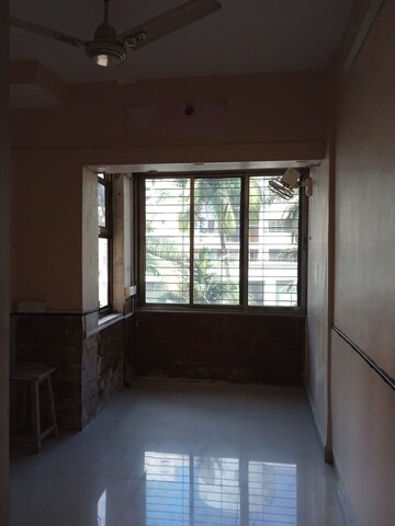 Room in 2 BHK Apartment at Rajkumar Corner CHS, Andheri West – for Rent