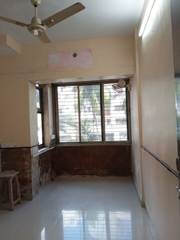 Room in 2 BHK Apartment at Rajkumar Corner CHS, Andheri West – for Rent
