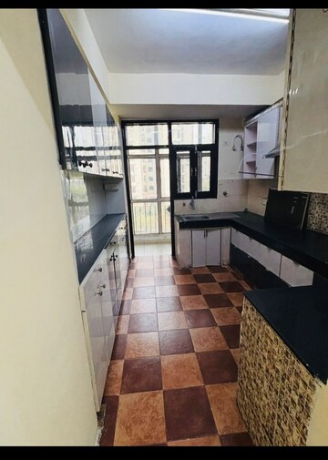 Kitchen in 4 BHK Apartment at Quantum Colonisers Quantum Residency, Raj Nagar Extension – for Sale