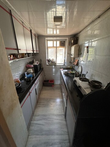 Kitchen in 1.5 BHK Apartment at Khar West – for Rent