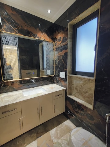 Bathroom in 3 BHK Builder Floor at Nehru Enclave – for Sale