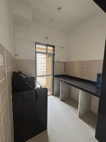 Kitchen in 1 BHK Apartment at JP North Alexa, Mira Road – for Rent