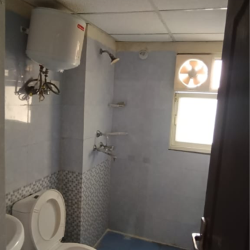 Bathroom in 3 BHK Apartment at Aims Golf City, Noida Central – for Rent