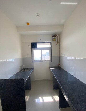Kitchen in 1 BHK Apartment at Ashar Axis, Majiwada – for Rent