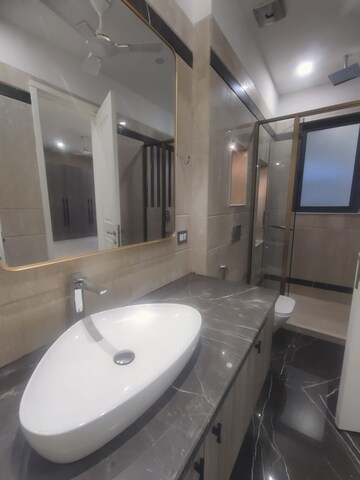 Bathroom in 3 BHK Builder Floor at Nehru Enclave – for Sale