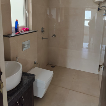 Bathroom in 2 BHK Apartment at Rishita Manhattan, Sarsawan – for Rent