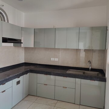 Kitchen in 2 BHK Apartment at Rishita Manhattan, Sarsawan – for Rent