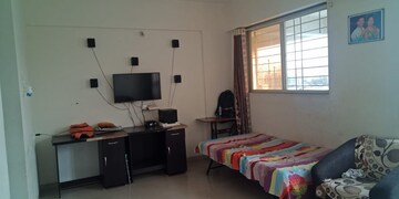 Living Room in 1 BHK Apartment at Sonigara Laurel, Wakad – for Rent
