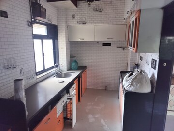 Kitchen in 2 BHK Apartment at Kanchan Pushp Society, Ghodbunder Road – for Rent