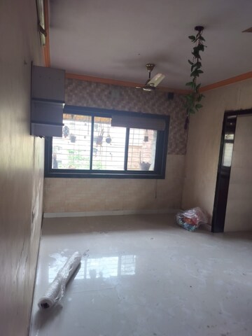 Room in 2 BHK Apartment at Kanchan Pushp Society, Ghodbunder Road – for Rent