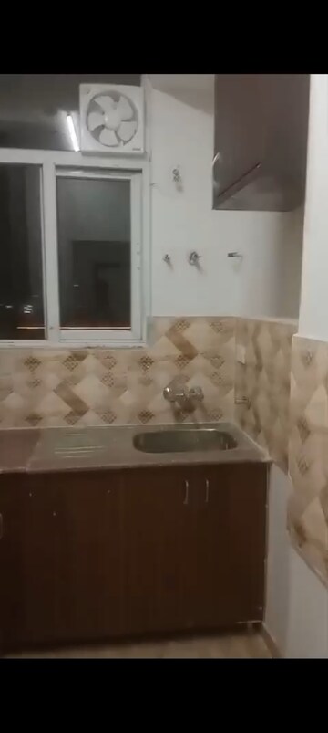 Kitchen in 2.5 BHK Apartment at Amrapali Riverview, Amrapali Leisure Valley – for Rent