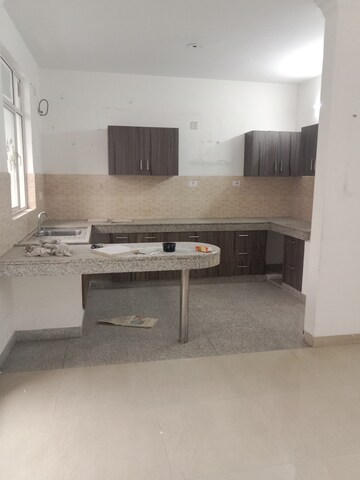 Kitchen in 2 BHK Apartment at Raheja Vedaanta, Sector 108 – for Sale
