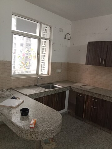 Kitchen in 2 BHK Apartment at Raheja Vedaanta, Sector 108 – for Sale