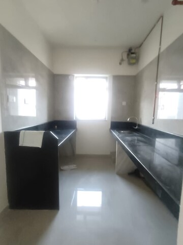 Kitchen in 1 BHK Apartment at Sheth Irene, Malad West – for Rent