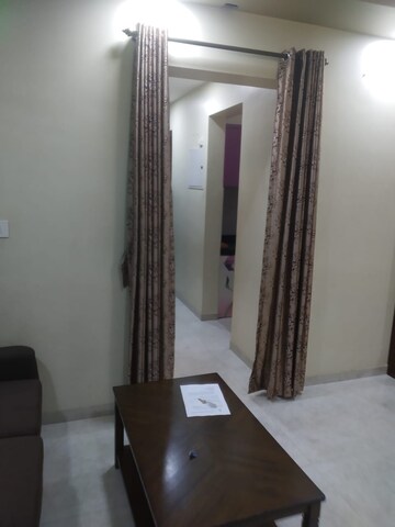 Living Room in 1.5 BHK Apartment at Lodha Palava City, Dombivli East – for Rent