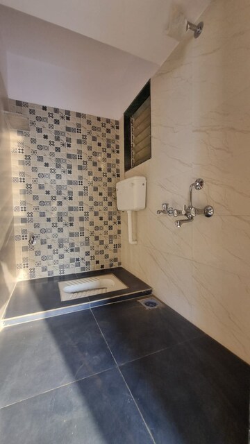 Bathroom in 1 BHK Apartment at Ashapura Galaxy, Ambivali – for Sale