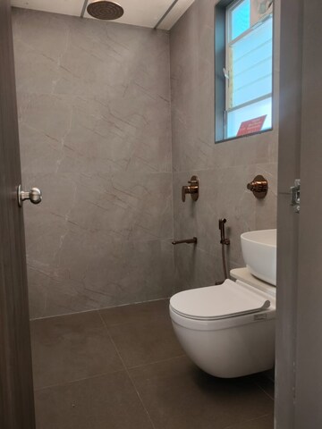 Bathroom in 3 BHK Apartment at Mika Triton Residency, Wadgaon Sheri – for Sale