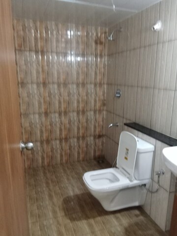 Bathroom in 3 BHK Apartment at Mantri Webcity, Hennur – for Rent